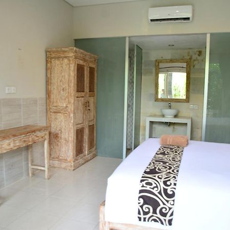 Asung Guesthouse Canggu Екстериор снимка
