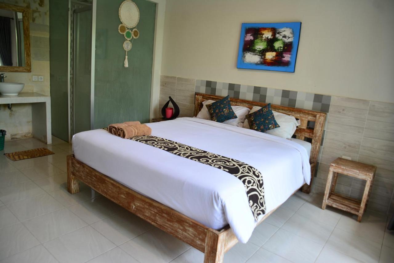 Asung Guesthouse Canggu Екстериор снимка