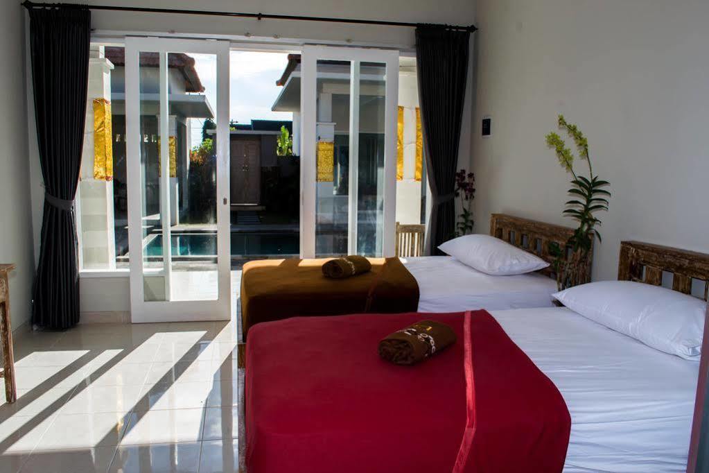 Asung Guesthouse Canggu Екстериор снимка
